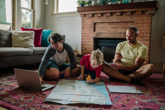 Young boy studying map