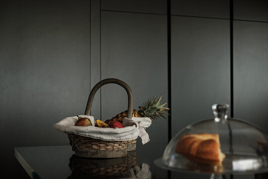 Fruit basket on the counter in an elegant kitchen