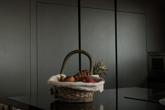 Fruit basket on the counter in an elegant kitchen