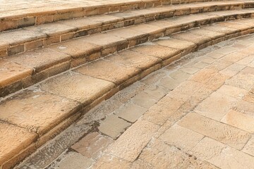Building exterior stairs with antique red brown granite tiles