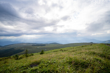 長野県諏訪市の霧ヶ峰を登山している風景 A view of climbing Kirigamine Peak in Suwa City, Nagano Prefecture.