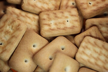 Close up view rectangular biscuits with small pores