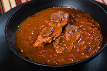 detailed photo of a Traditional Guatemala Red Beans with pork meat