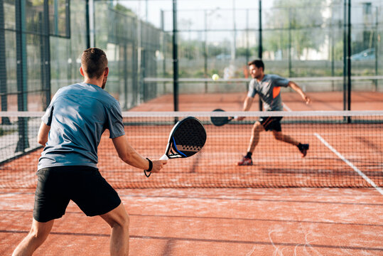 Men playing padel