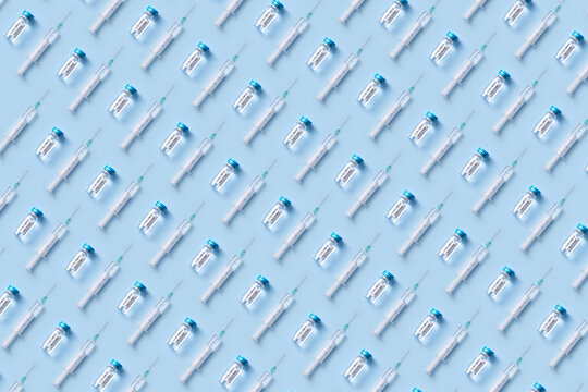 Pattern of vaccine bottles and syringes
