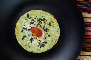 guacamole typical tostada from Guatemala