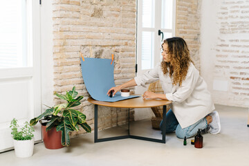 Beauty blogger taking photos of cosmetic products