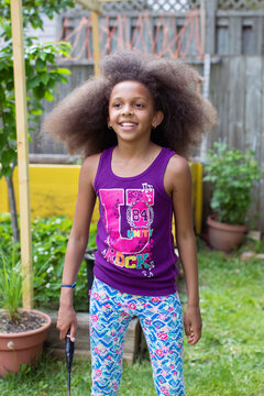 Young girl holding a badminton racket