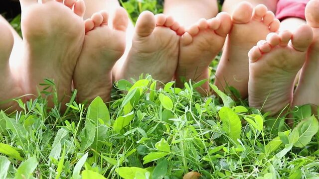 bare foot care, kids soles on grass