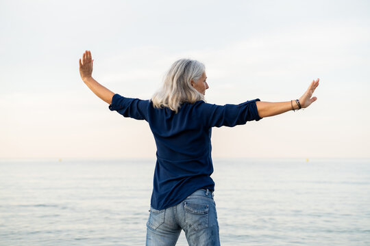 Beautiful Mature Woman Relaxing At Beach