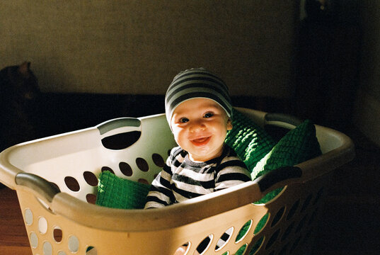 Cute Baby in Laundry Basket