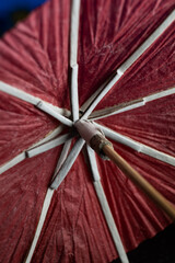 Red umbrella from inside on a black background