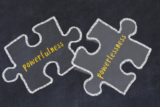 Ploblem solving. Chalk sketch of two puzzles with words powerfulness and powerlessness