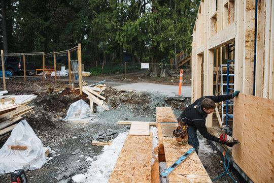 Man working construction in winter