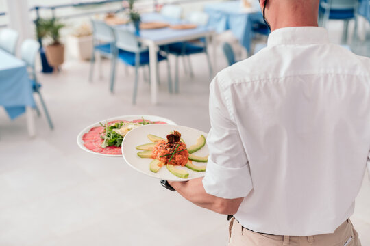 Waiter working at a restaurant