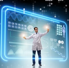 Doctor in futuristic medical concept pressing button