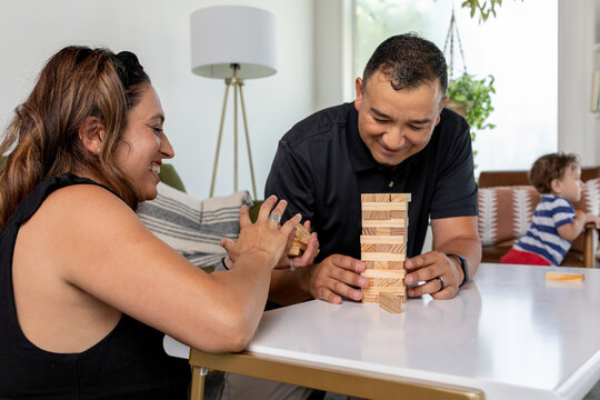 Mom and Dad Stack Wooden Blocks
