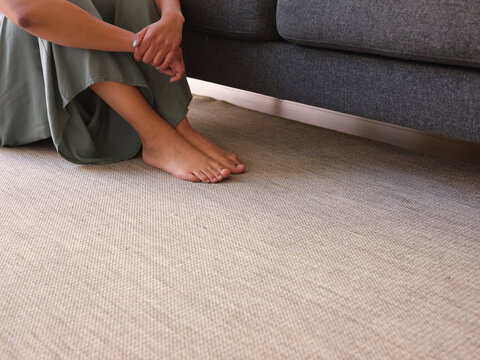 Black barefoot woman.