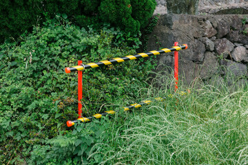 a stick with red and yellow stripes