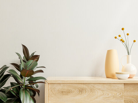 Wall mockup with Vase and green plant,White wall and shelf.