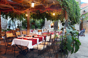 Empty restaurant at Budva Old Town Center in Budva, Montenegro. Budva among the oldest urban settlements of the Adriatic coast.