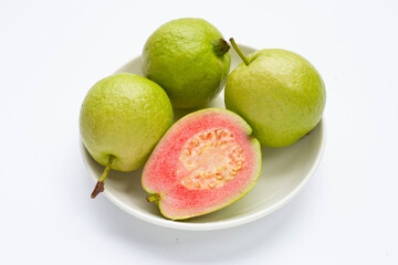Fresh pink guava on white background.