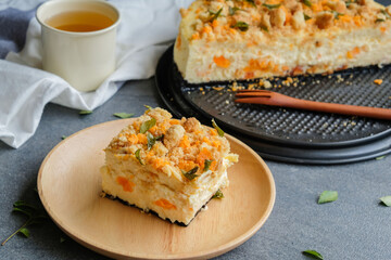 Delicious homemade pastry. Salted Egg Cheese Cake. Ingredients cheese, sour cream, cream cheese, walnut cookies, curry leaves and salted egg yolk only