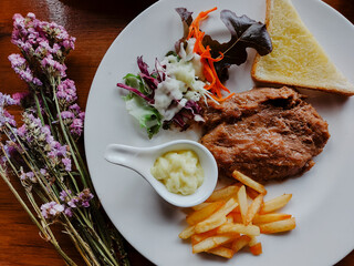 Pork  Steak and French Fries
