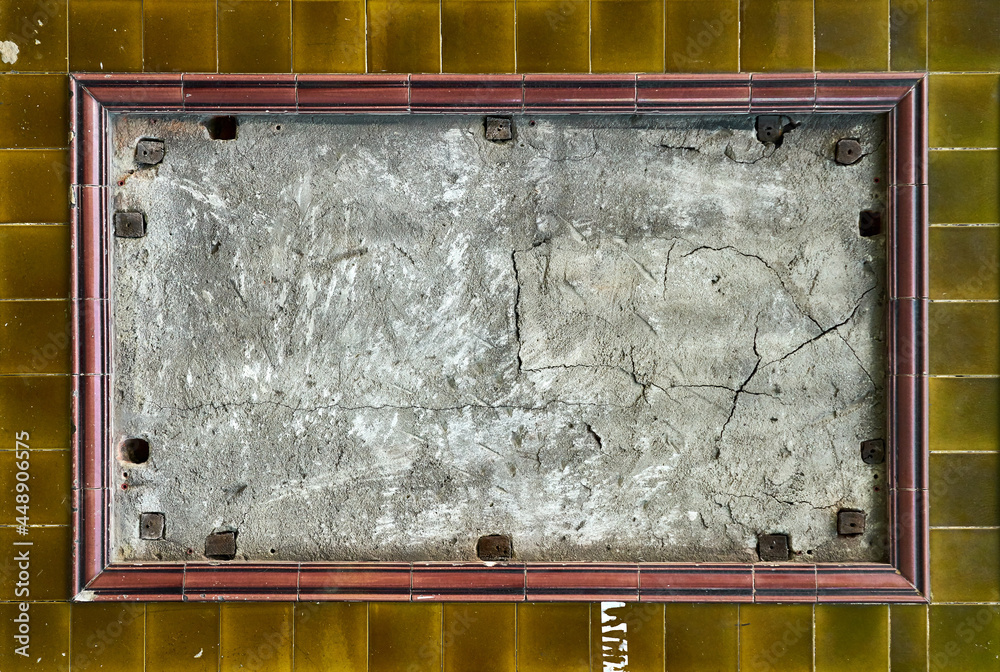 Canvas Prints Closeup shot of an empty sign frame on brown tiles surface