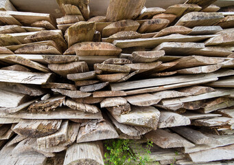 raw wood, stack of wooden planks, cut pine stacked for seasoning