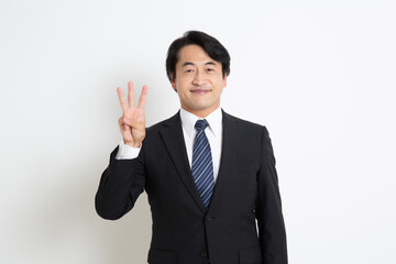 中年のサラリーマン日本人男性