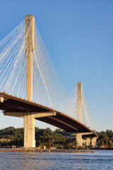 Port Mann Bridge over the Fraser River. Sunny Summer Sunset. Port Coquitlam, Vancouver, British Columbia, Canada.