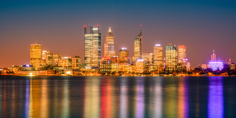 Sunset view of Perth city skyline and the Swan River seen from Mill Point. The modern city of Perth is the state capital of Western Australia, Australia.