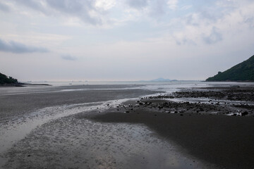 Mud beach at low tide at sunset 