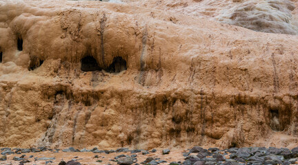 Georgia. Mineral spring - water flows down a travertine rock.