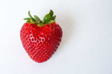 Ripe strawberries on a white background.