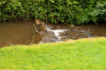 Small stream and waterfall in a park