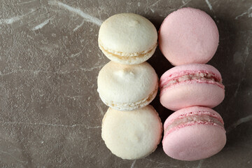 Concept of tasty dessert with delicious macaroons