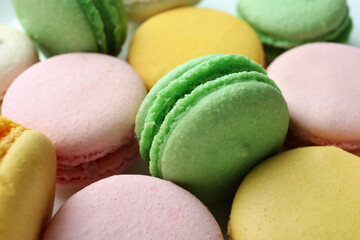 Concept of tasty dessert with macaroons, close up