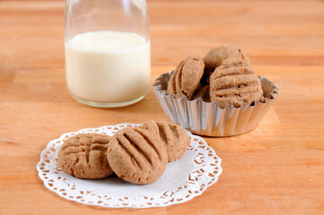 Cookies and milk on table