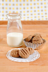 Cookies and milk on table