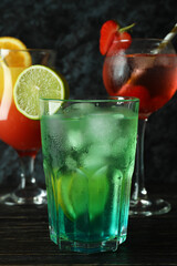 Fresh summer cocktails on wooden rustic table