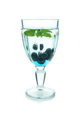 Glass of fresh blueberry cocktail isolated on white background