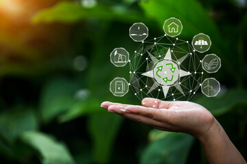 Technology, hand holding with environment Icons over the Network connection on green background