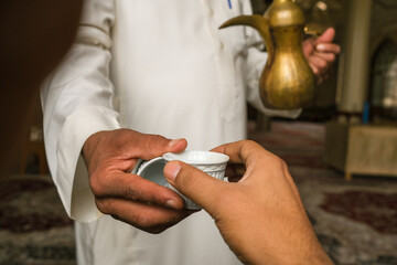 photo of traditional Arab coffee in mosque