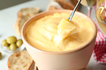 Concept of delicious food with fondue, close up
