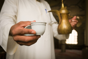 photo of traditional Arab coffee in mosque