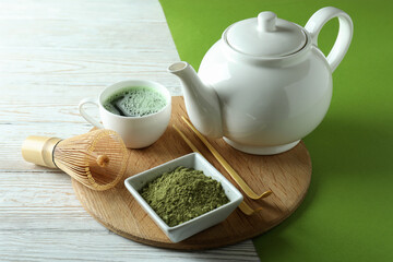 Concept of japanese tea with matcha on white wooden table