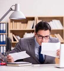 Businessman receiving letter in the office