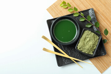 Concept of japanese tea with matcha on white background